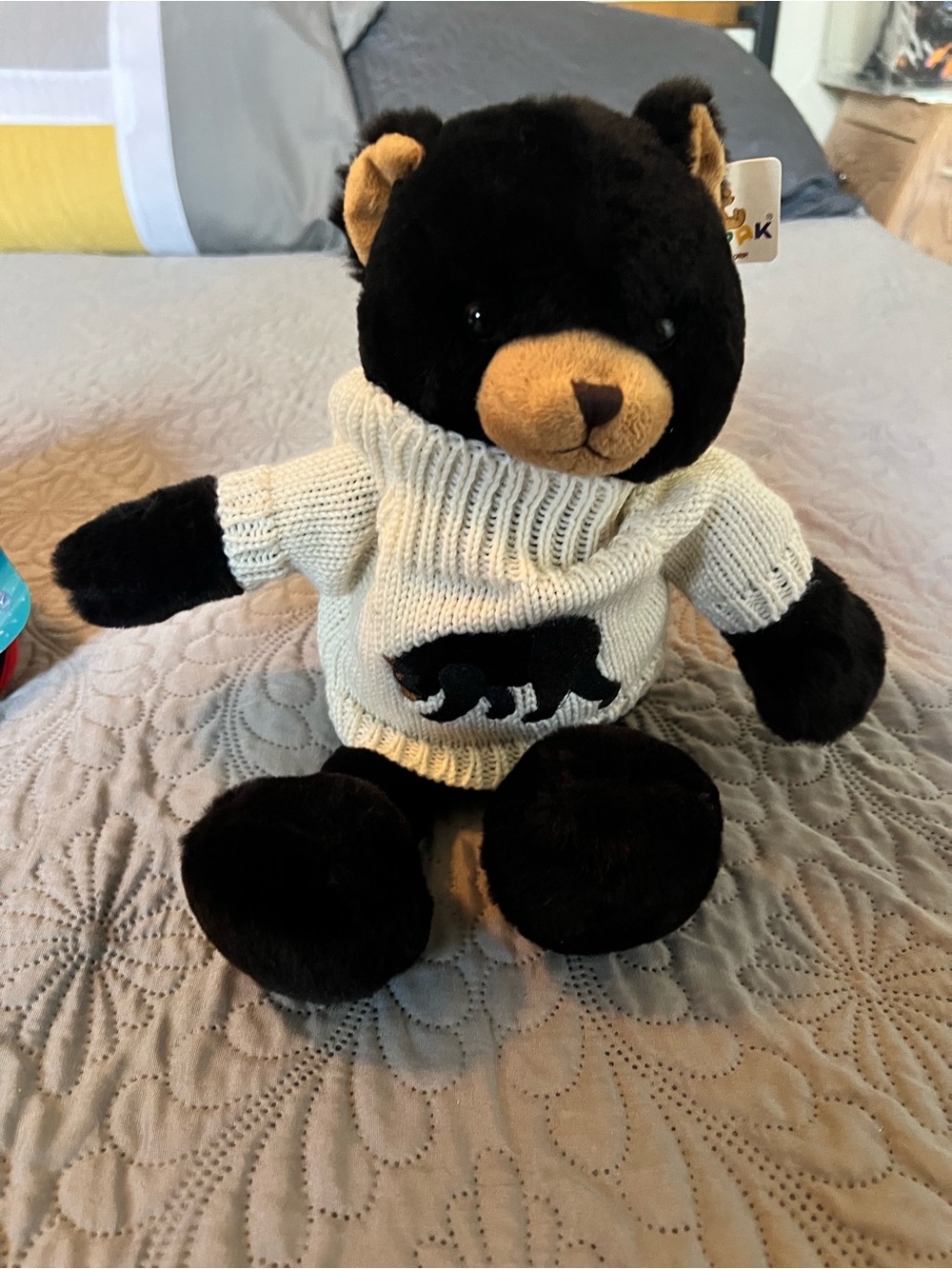 Black Bear Plush with Cream Knit Sweater